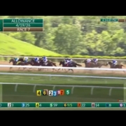 keeneland-race-7-midpack-approaching-far-turn-apr-19-2026 Keeneland Race 7 field in midpack during early stretch, April 19 2026 allowance race