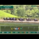Keeneland Race 7 field in midpack during early stretch, April 19 2026 allowance race